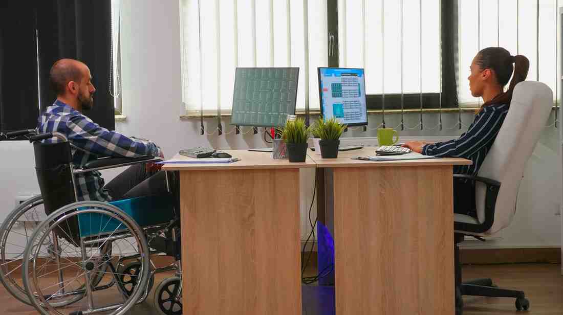 Team collaborating in an accessible workplace